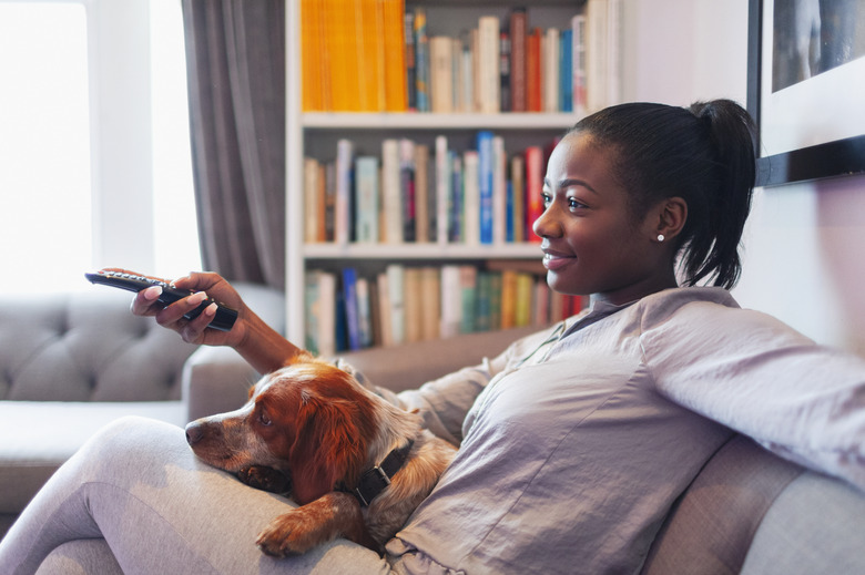 Young woman and dog relaxing