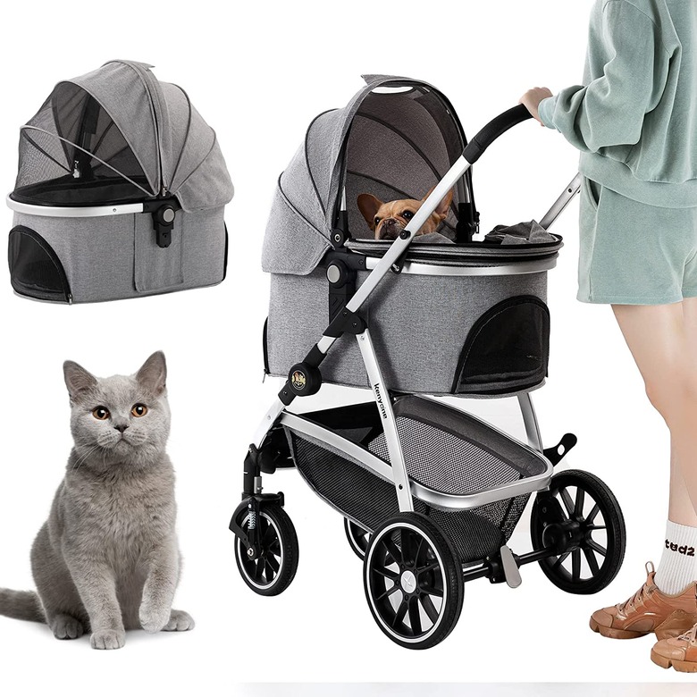Gray pet stroller with a removeable carrier.