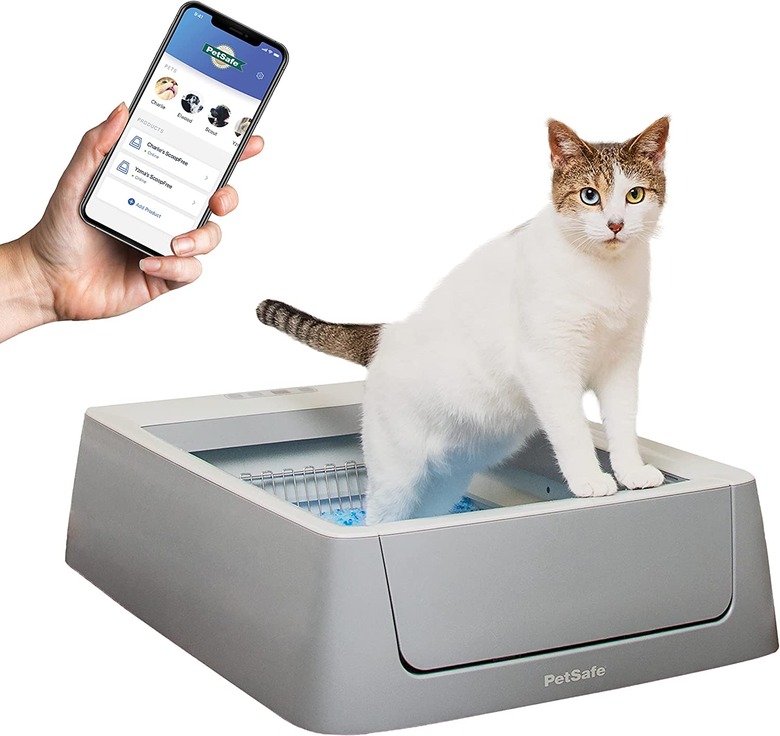 WiFi-enabled self-cleaning cat litter box with crystal litter trays.