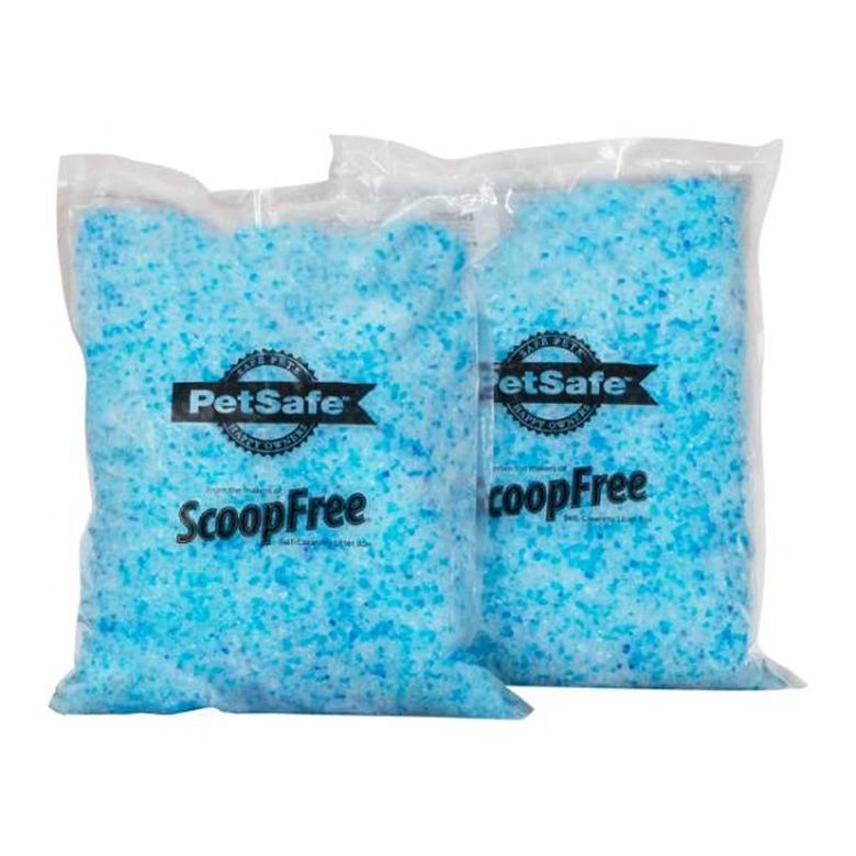 Two 4.5-pound bags of PetSafe ScoopFree Premium Crystal Cat Litter against a white background. The crystal litter is different shades of blue with some clear crystals mixed in.
