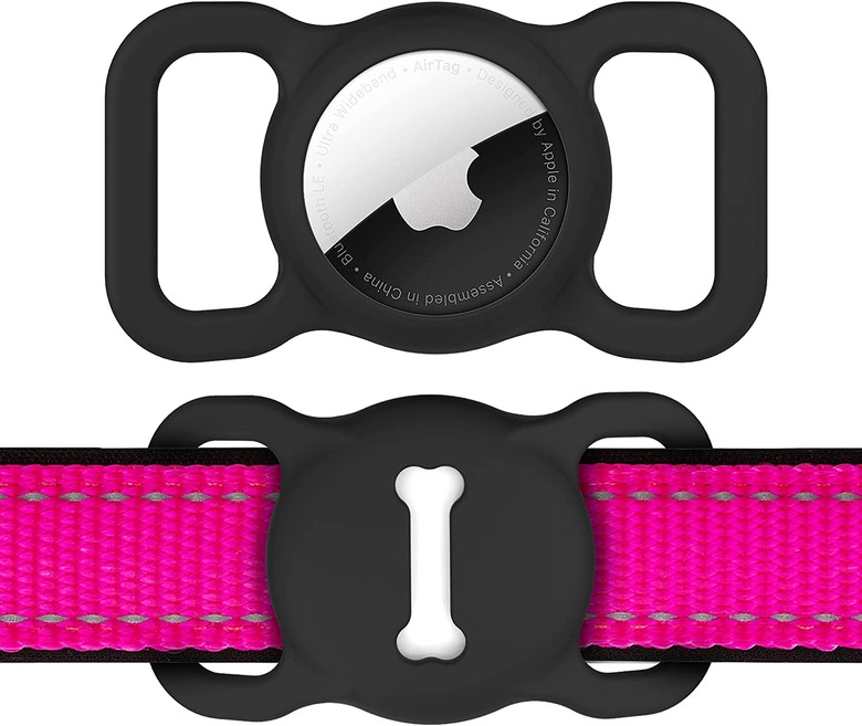 Black silicone Air Tag holder that slips over a dog's collar and has a bone motif on it.