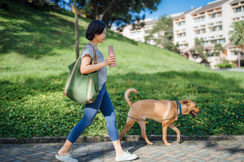 Young Asian woman holding a reusable drinking bottle