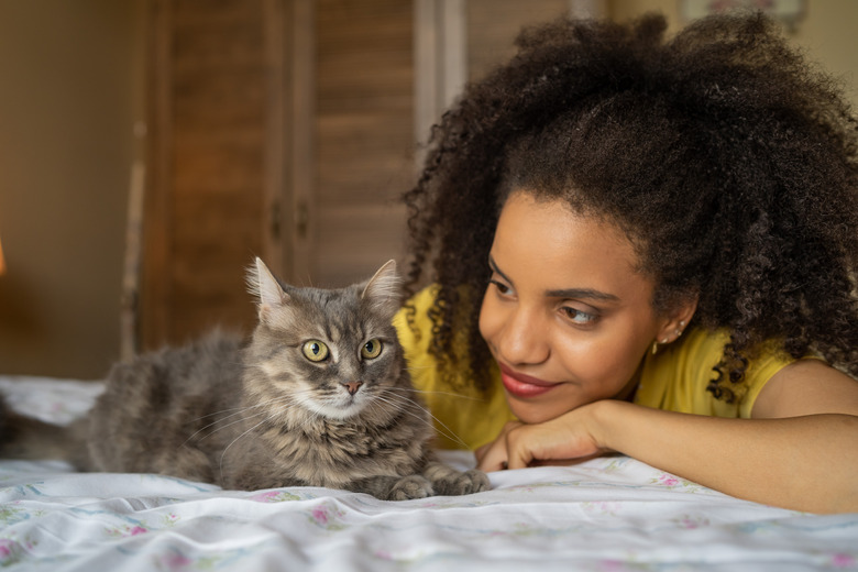 Young afro woman at home