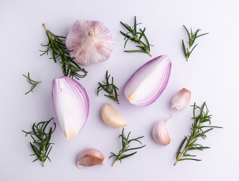 red onion rosemary garlic isolated on white background