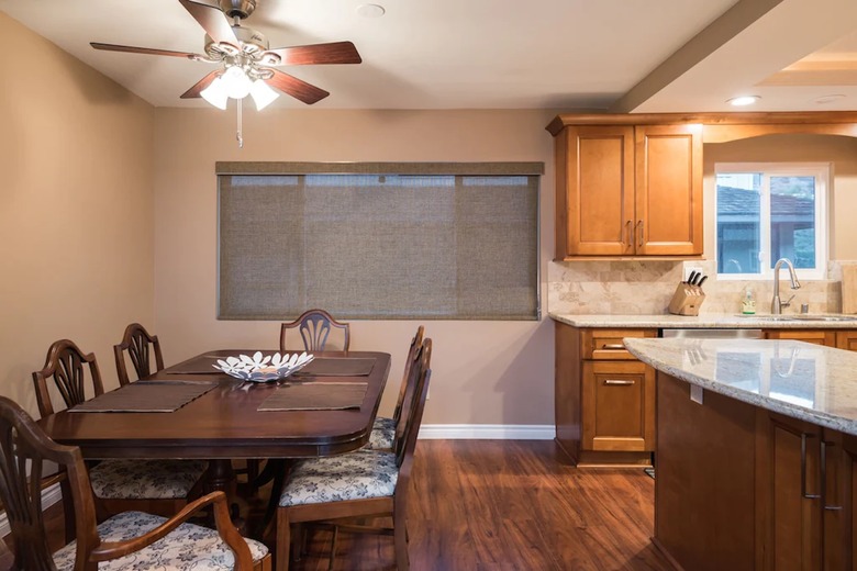 Dining area and kitchen in Laguna Beach townhouse.