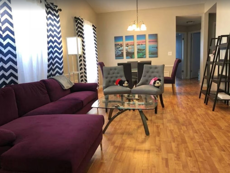 Living and dining area with hardwood floors in Orlando