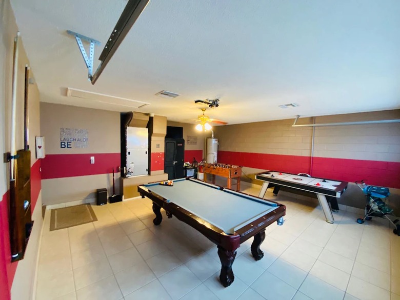 Garage game room with pool table