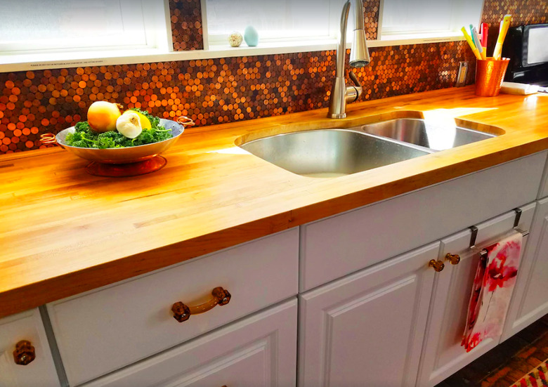 A penny-tiled backsplash at the Copper Penny House in Madrid