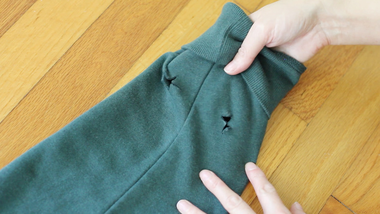Armholes cut into sleeve