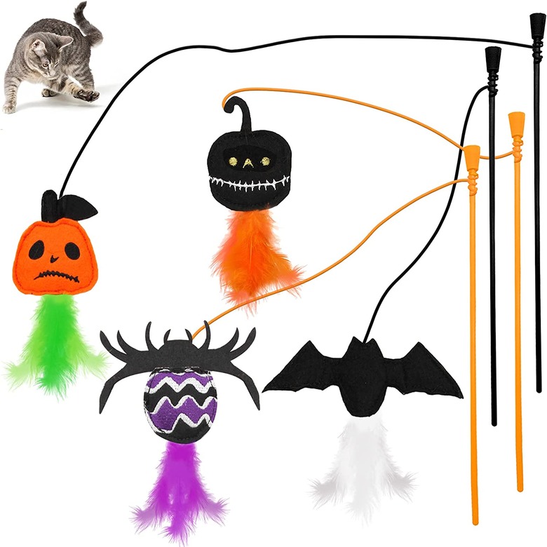 Four cat teaser wand toys with catnip-filled Halloween characters with feathers including a spider