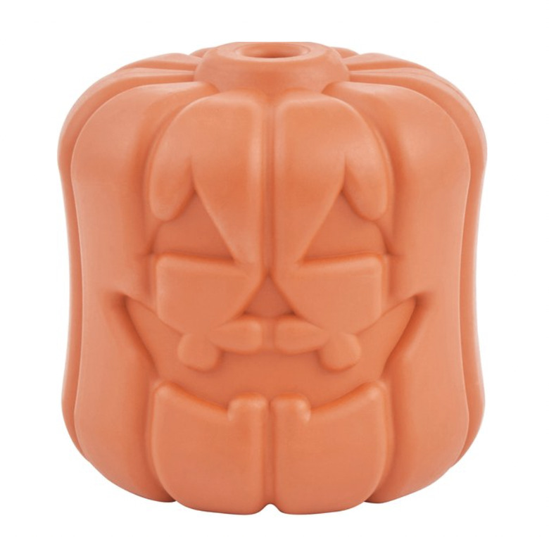 Jack-o'-lantern shaped treat dispensing toy with an opening at the top. The toy is dishwasher-safe in the top rack.