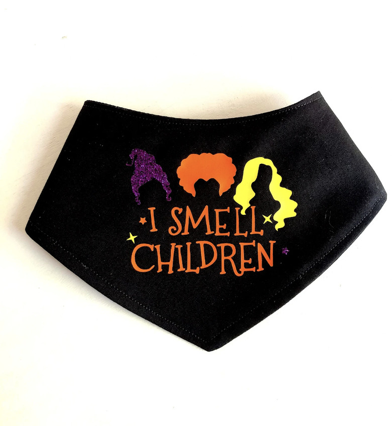Black bandana with the hair silhouttes of the Sanderson sisters and the words I Smell Children.
