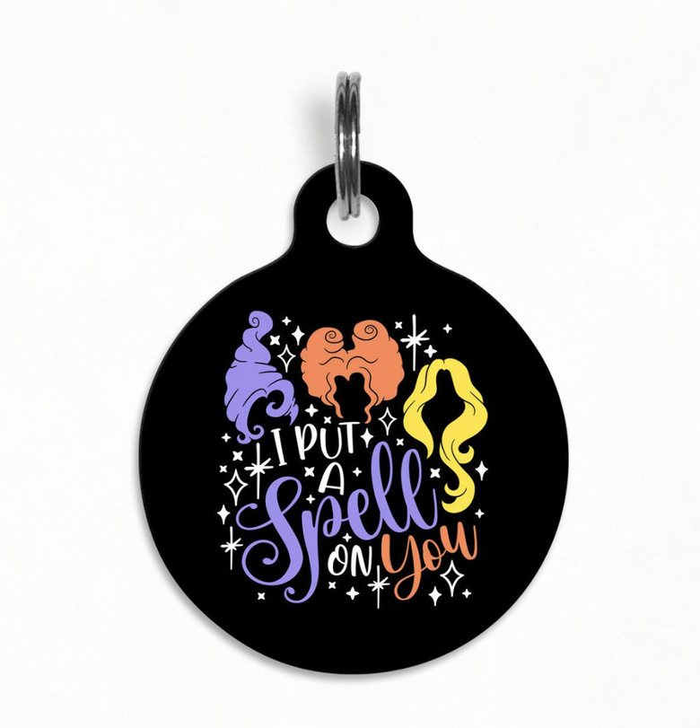 Hocus Pocus pet ID tag with the hair silhouettes of the Sanderson sisters and the words I put a spell on you.