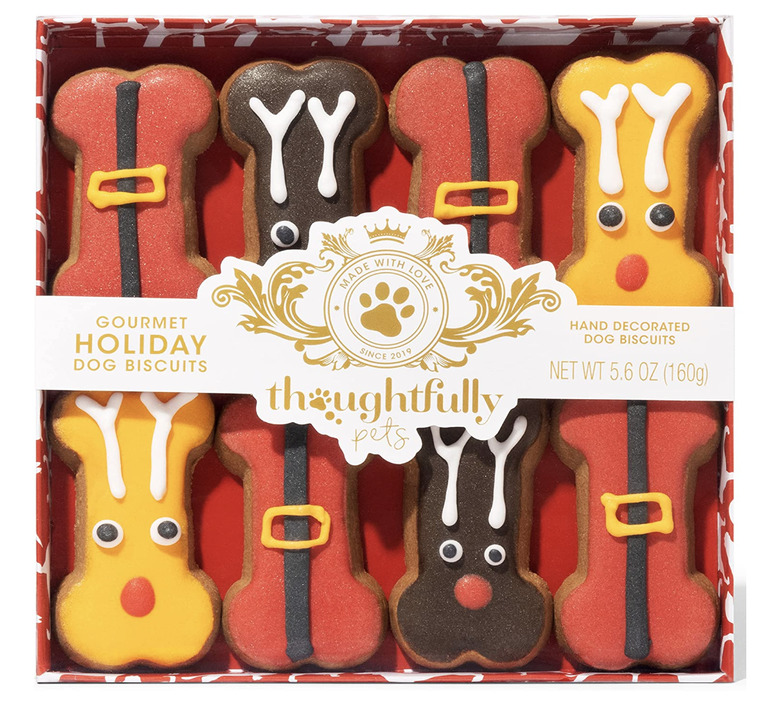 Handmade Christmas dog treats bone-shaped that resembled reindeers and Santa's suit.