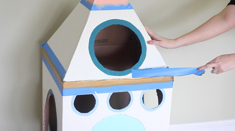 Pulling tape off painted stripe