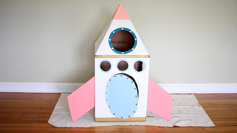 Two wings attached to rocket ship