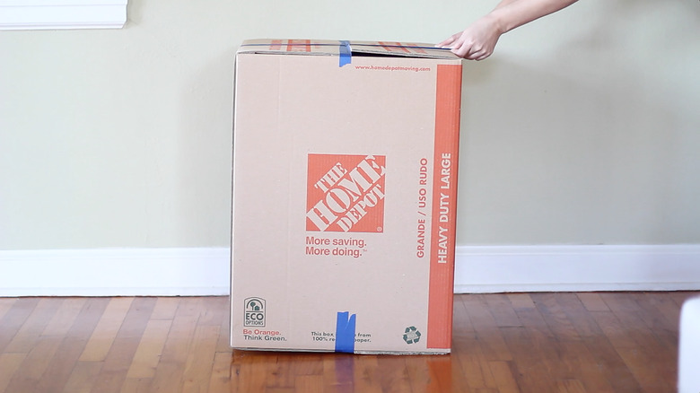 Taping box shut