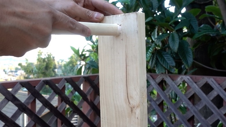 Assembling DIY dog puzzle feeder.