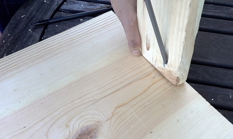 Assembling DIY dog puzzle feeder.