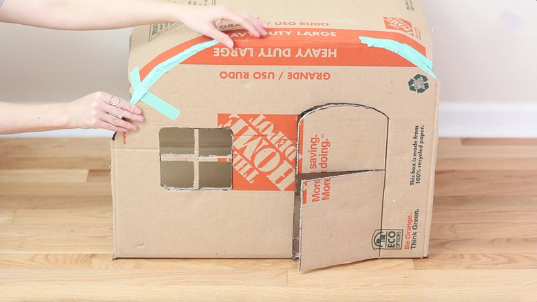 taping roof curve in place