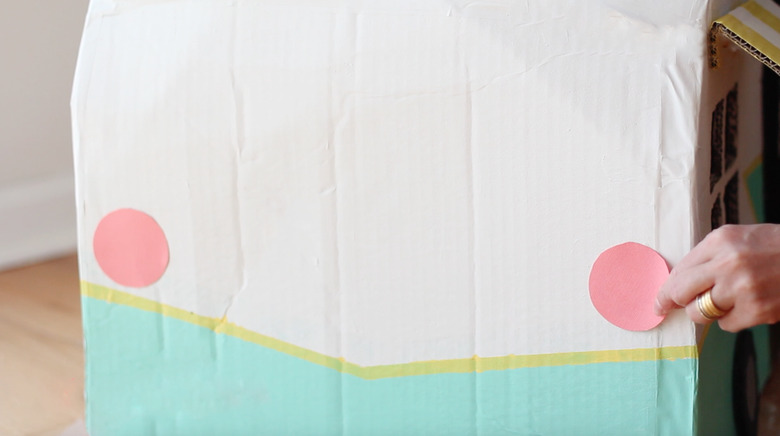 gluing tail lights onto camper