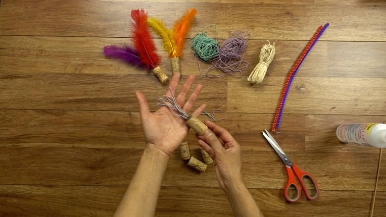 Tassel toy made from hemp twine and wine cork.