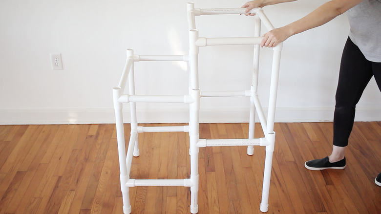 Inserting fourth level into third level of cat tree