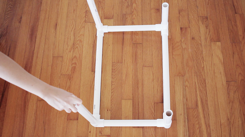 Inserting legs into fourth level