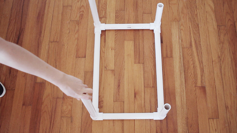 Inserting legs into fifth level