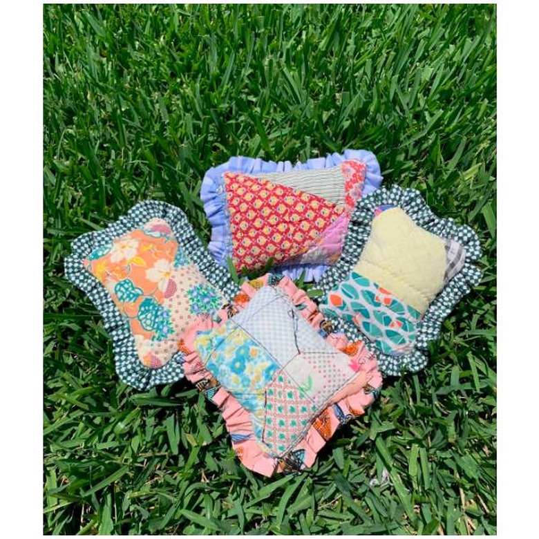 Several handsewn small cat pillow toys filled with catnip