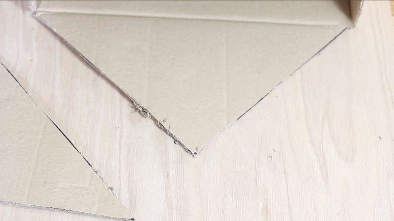 cutting box flap into triangle