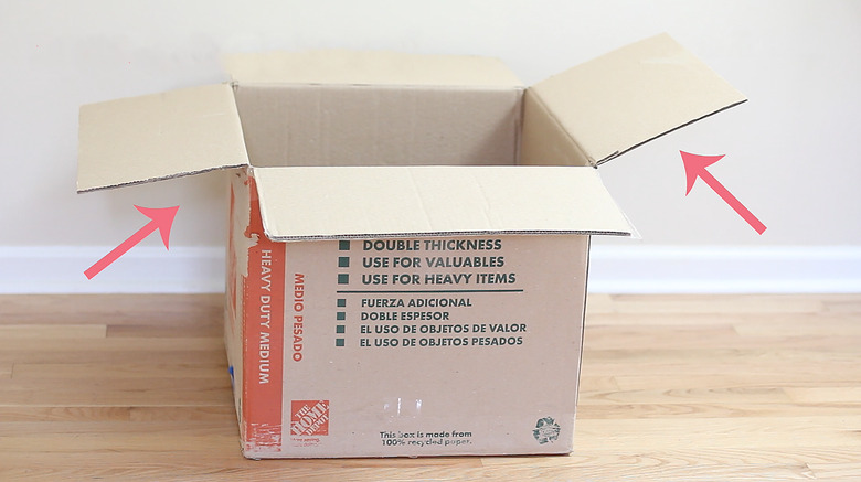 arrows indicating which side flaps to cut off