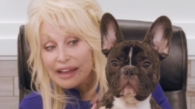 Dolly Parton holds her 