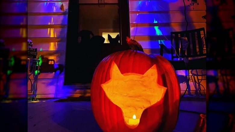 simple carving of dog in pumpkin