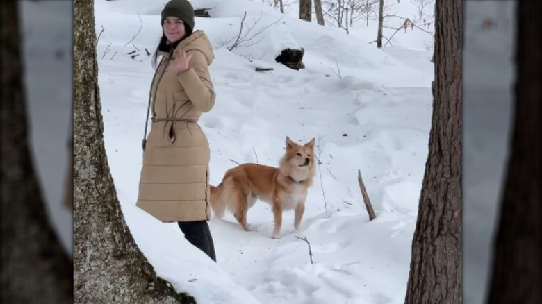 Isabel Klee and her dog Simon in the snow
