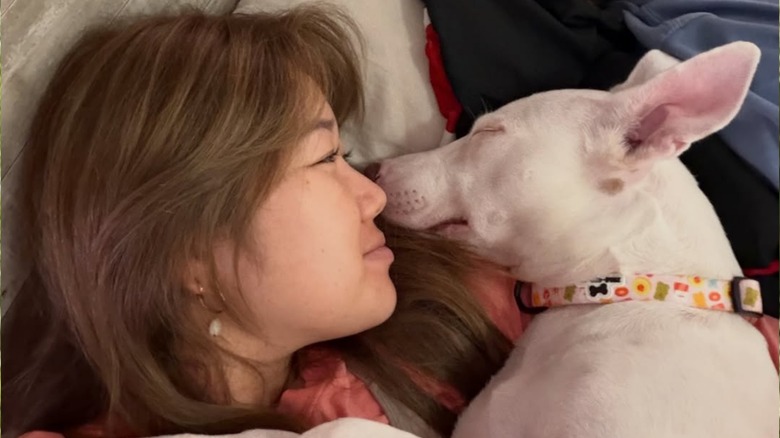 New owner Amy with rescued dog, Mahina