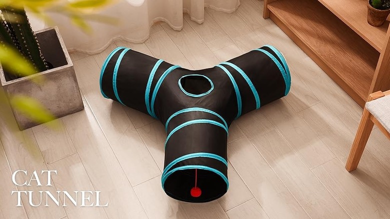 A black-and-blue cat tunnel with four openings